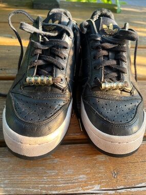 adidas Forum Black Leather Low-Top Sneakers with Gold Accents